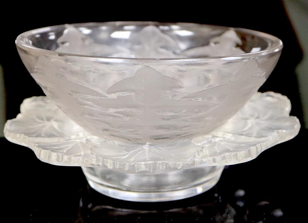 René Lalique. A pre-war Pissenlit No.1 pattern bowl, no.3215, designed in 1921 and a post war Lalique leaf pattern bowl, 13 and 14.5cm